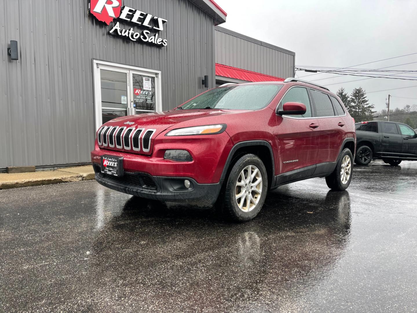 2014 Red /Black Jeep Cherokee Latitude 4WD (1C4PJMCB7EW) with an 2.4L I4 DOHC 16V engine, 9-Speed Automatic transmission, located at 11115 Chardon Rd. , Chardon, OH, 44024, (440) 214-9705, 41.580246, -81.241943 - Photo#0